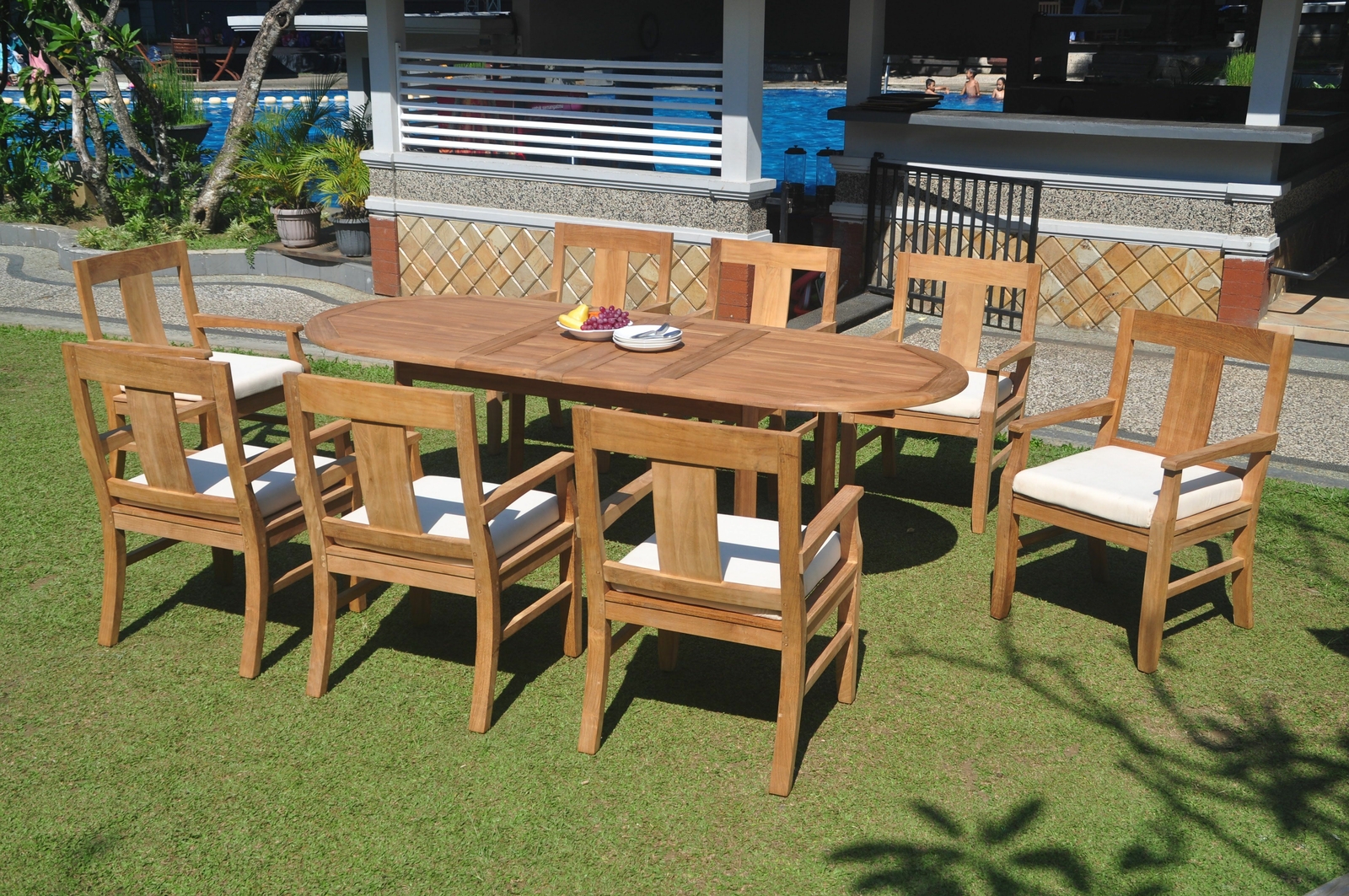 9 PC OUTDOOR DINING TEAK SET – 94″ OVAL EXTENSION TABLE, 8 ARM CHAIRS OSBORNE